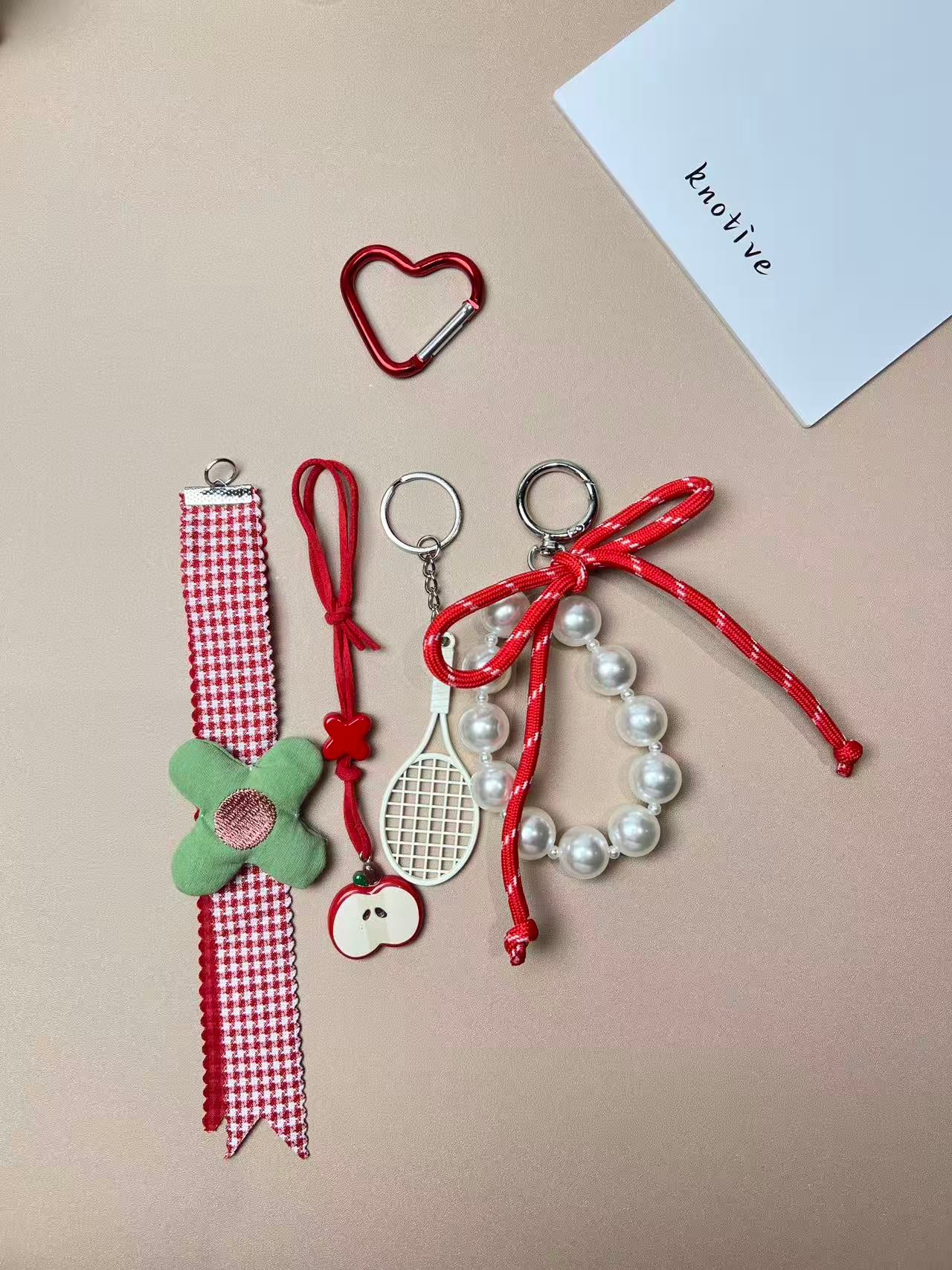 Tennis Racket Pearl Bag Charm | Knotive