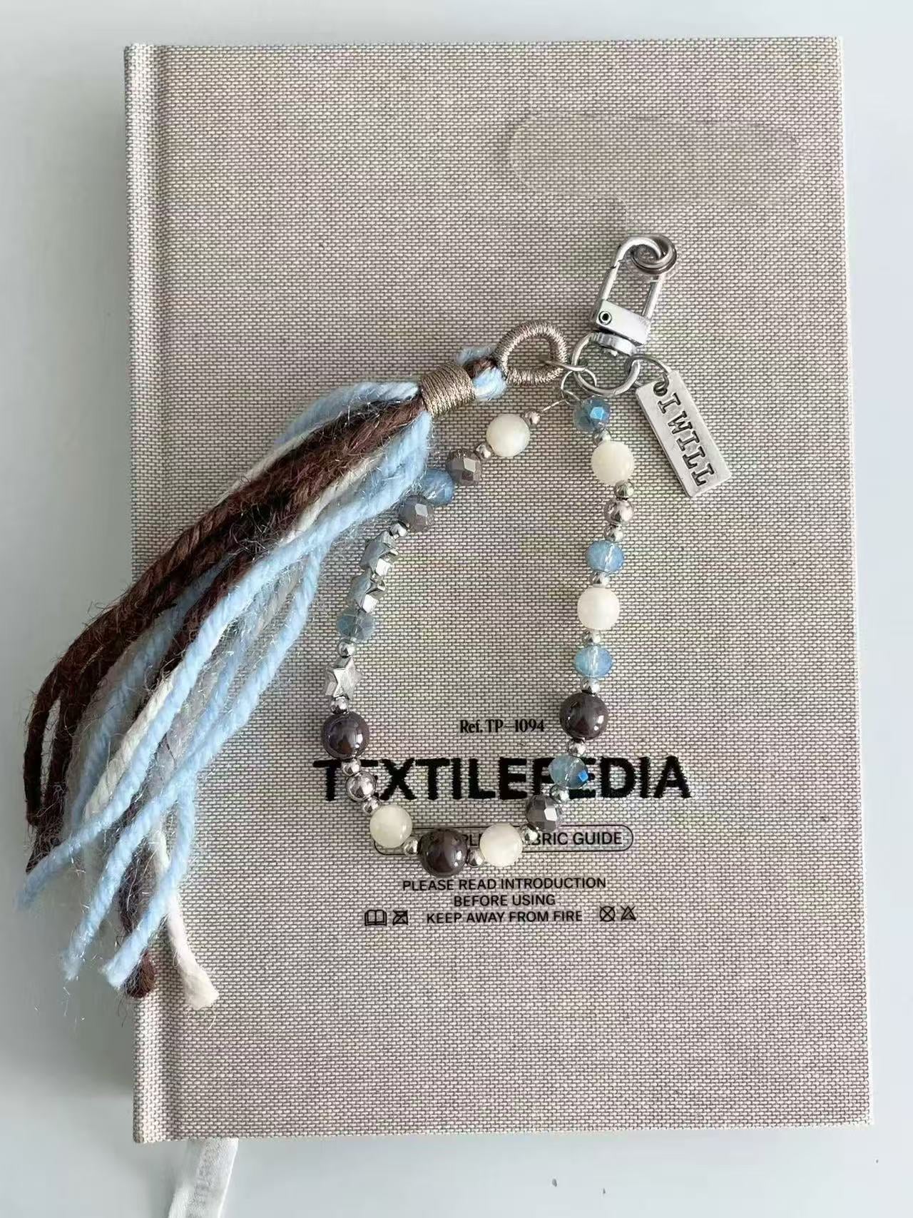 Starlight Yarn Tassel Phone Charm | Knotive