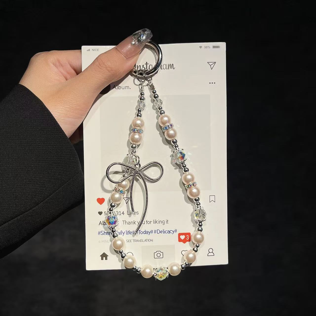 Pearl & Crystal Bow Phone Charm | Knotive