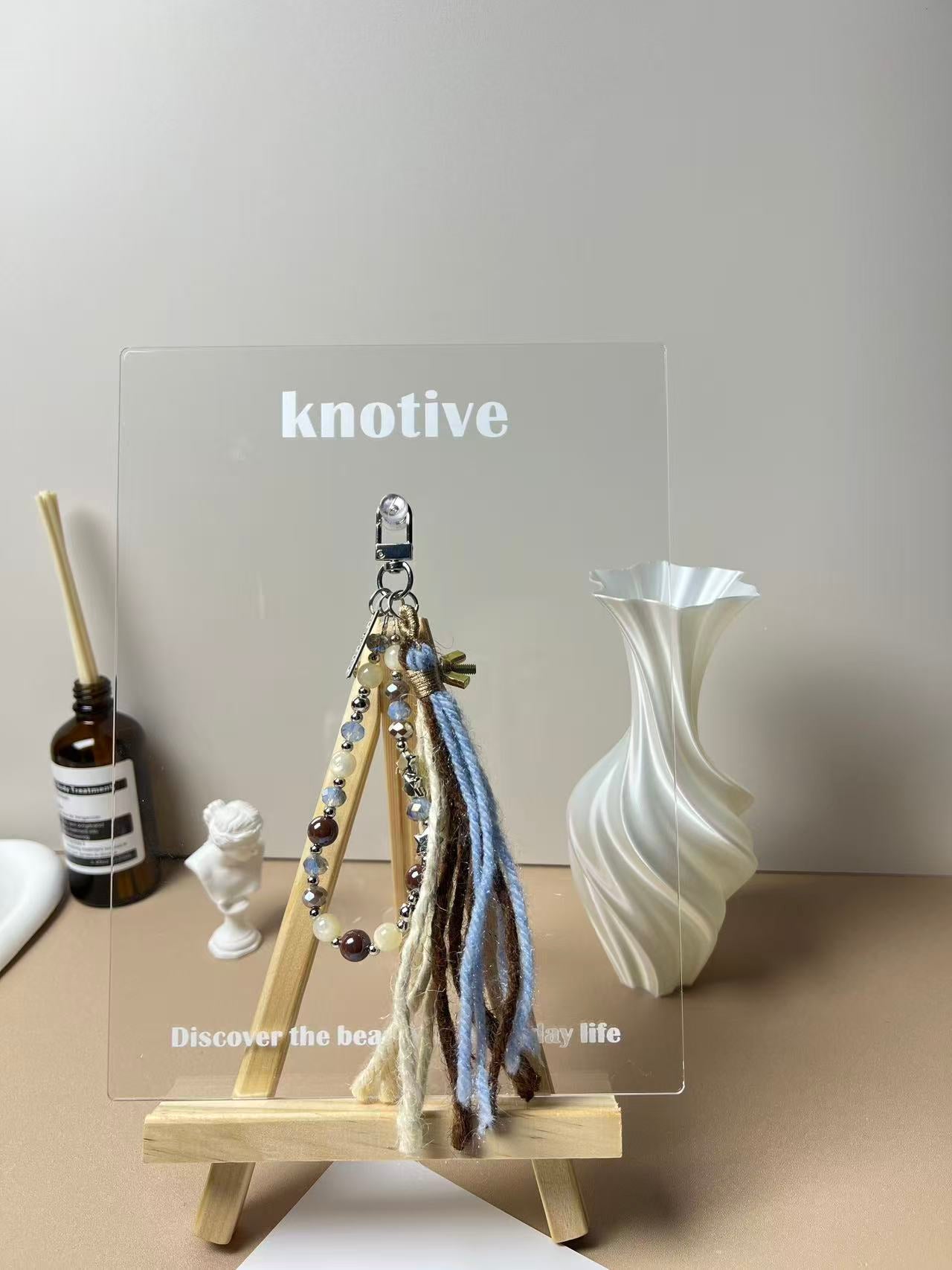 Starlight Yarn Tassel Phone Charm | Knotive