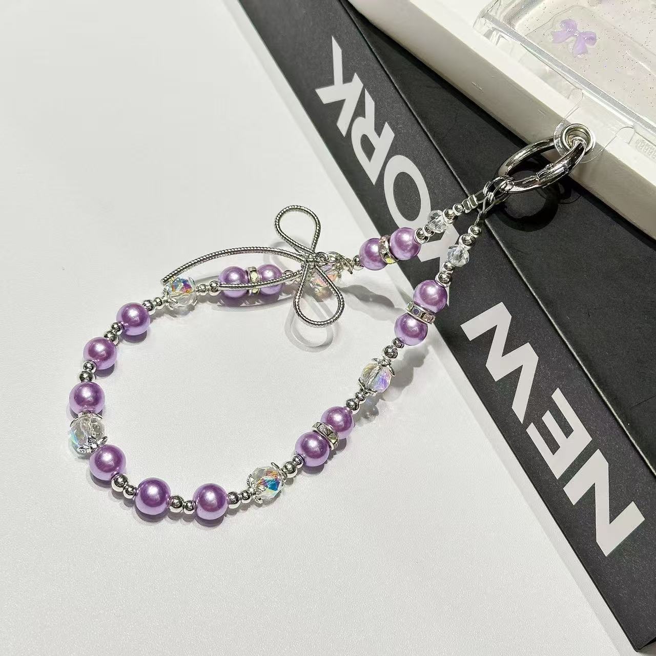 Pearl & Crystal Bow Phone Charm | Knotive