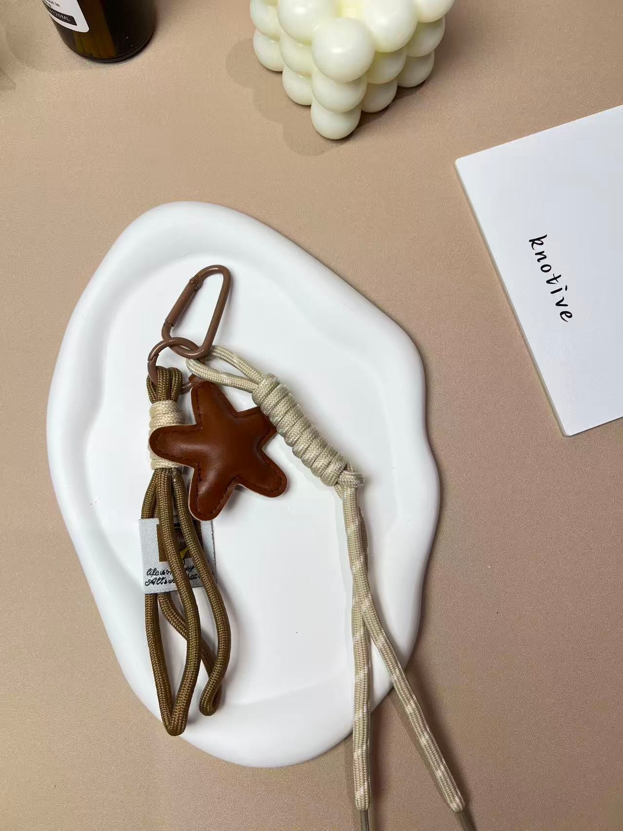 Soot Ball Bag Charm | Knotive