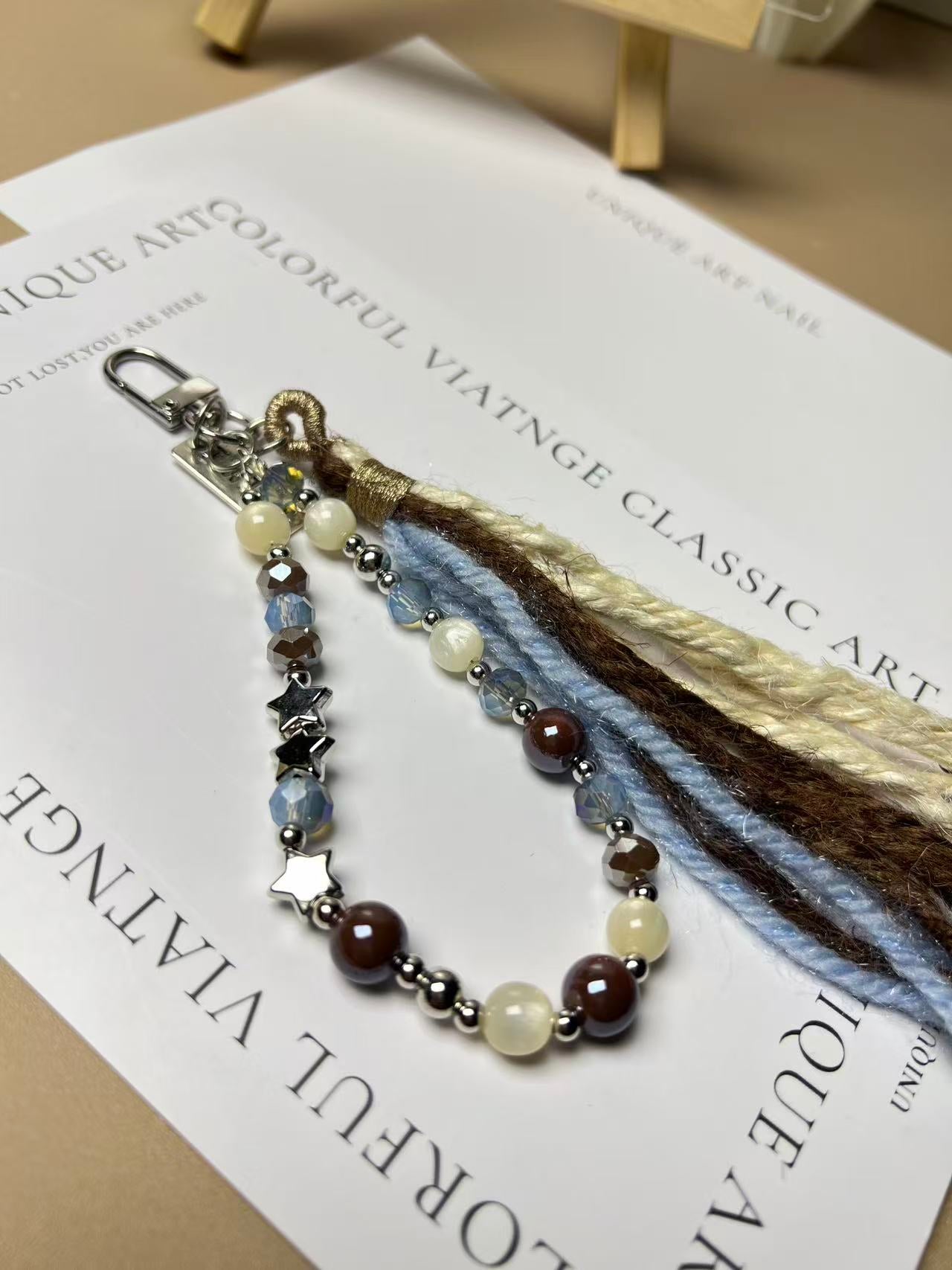 Starlight Yarn Tassel Phone Charm | Knotive