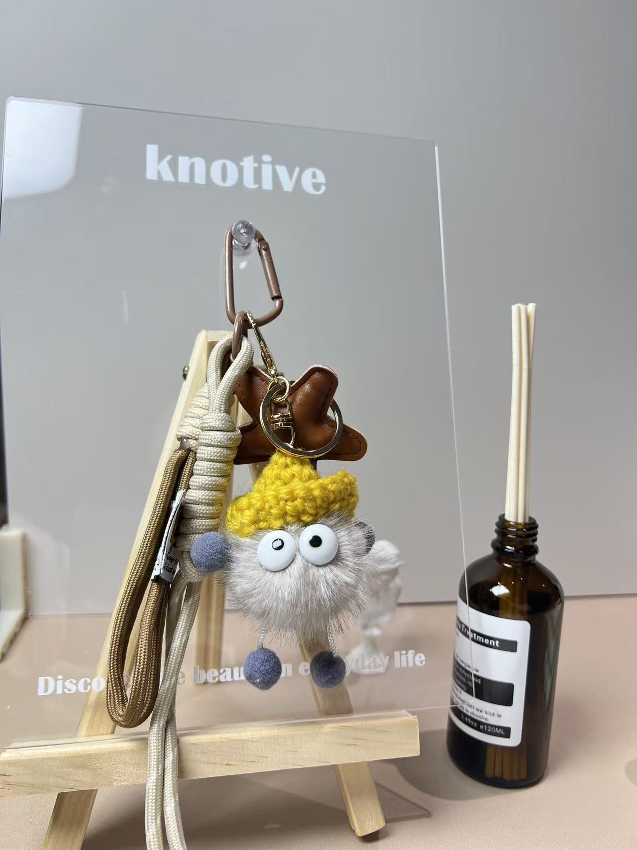 Soot Ball Bag Charm | Knotive