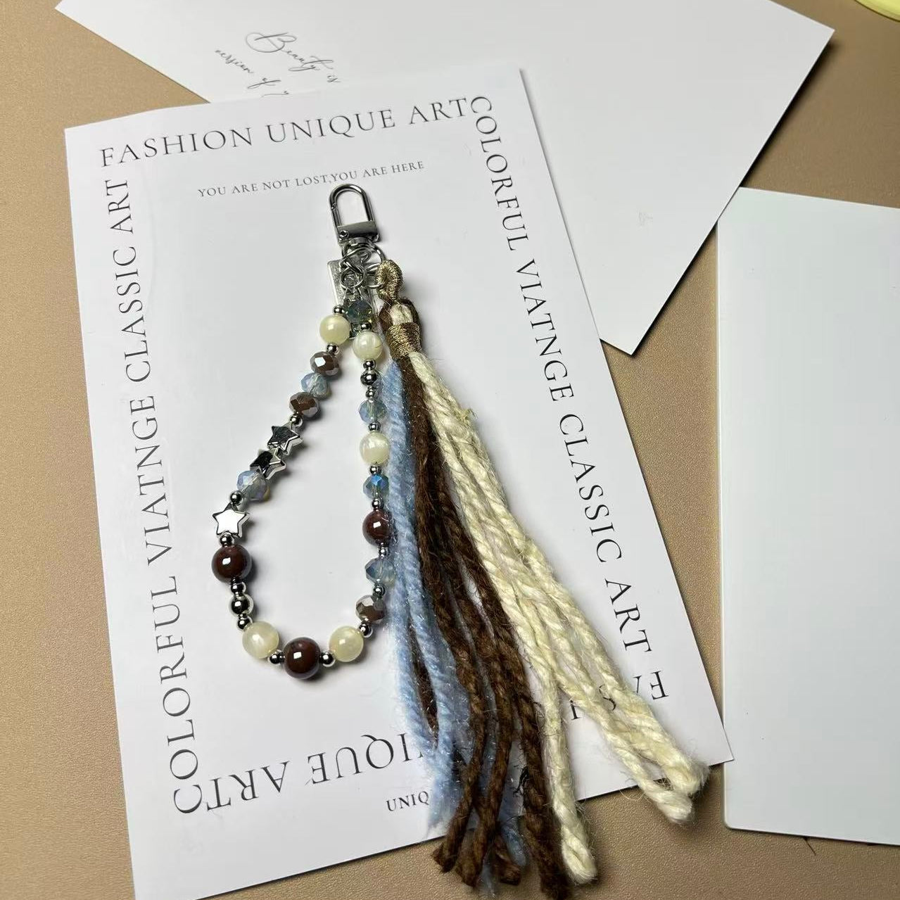 Starlight Yarn Tassel Phone Charm | Knotive