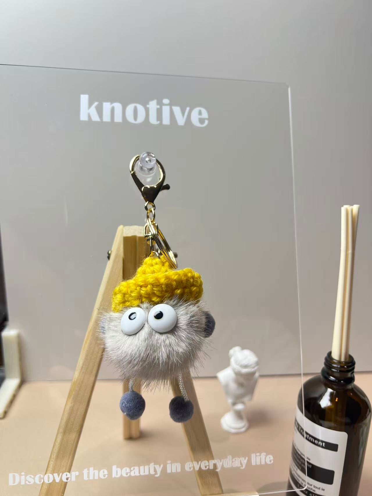 Soot Ball Bag Charm | Knotive