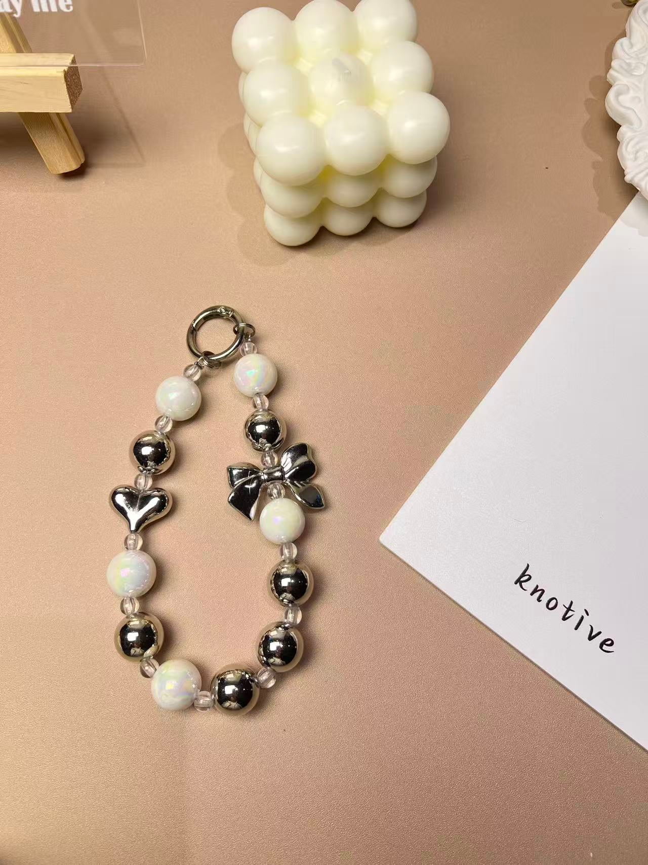 Metal  Bow Phone Charm | Knotive